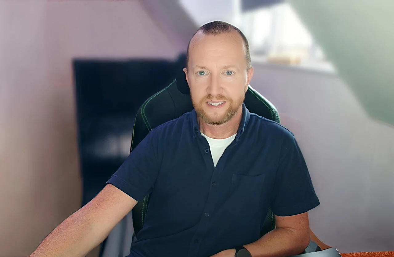 Dan at his desk where he teaches one-to-one online English lessons